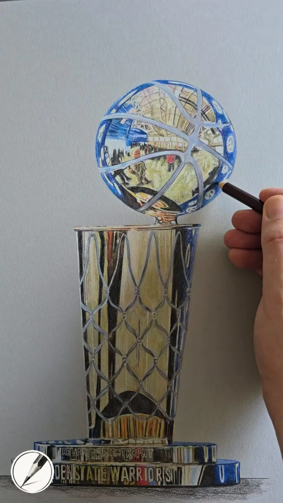 A hand adding detail to a trophy drawing in coloured pencil on grey paper