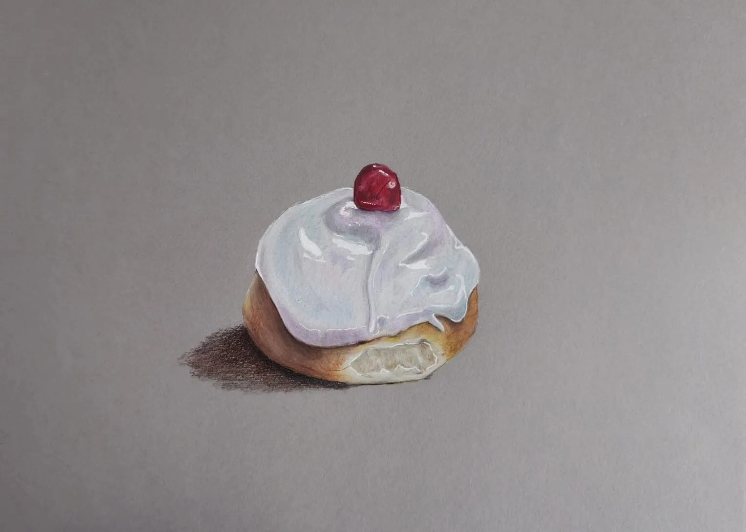 An iced bun topped with a cherry drawn in coloured pencil on grey paper